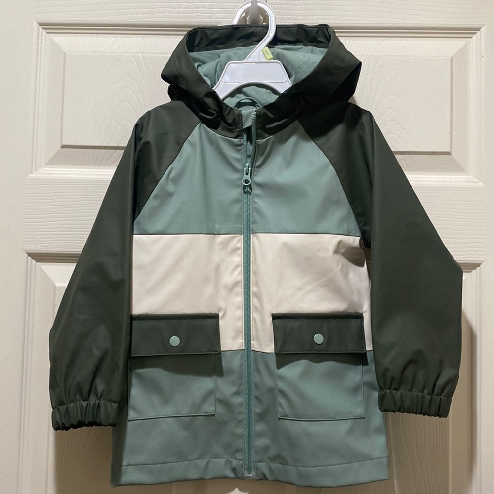 Green, mint and cream color block rain jacket